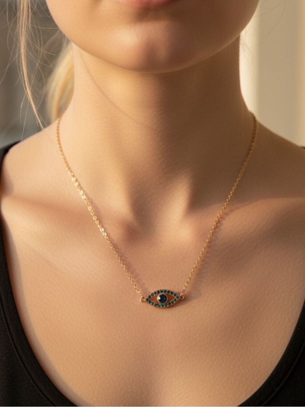 Gold Evil Eye Pendant Necklace with Blue Stones